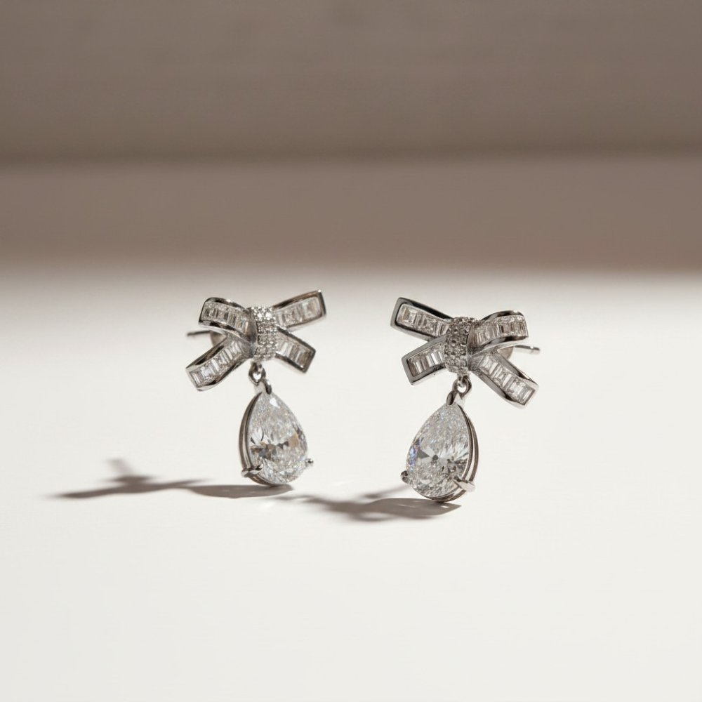Silver Bow Pear-Drop Earrings