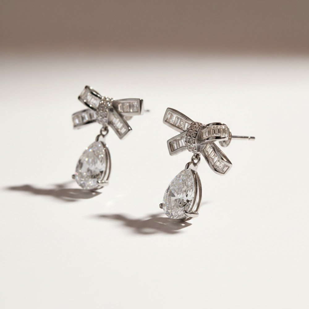 Silver Bow Pear-Drop Earrings