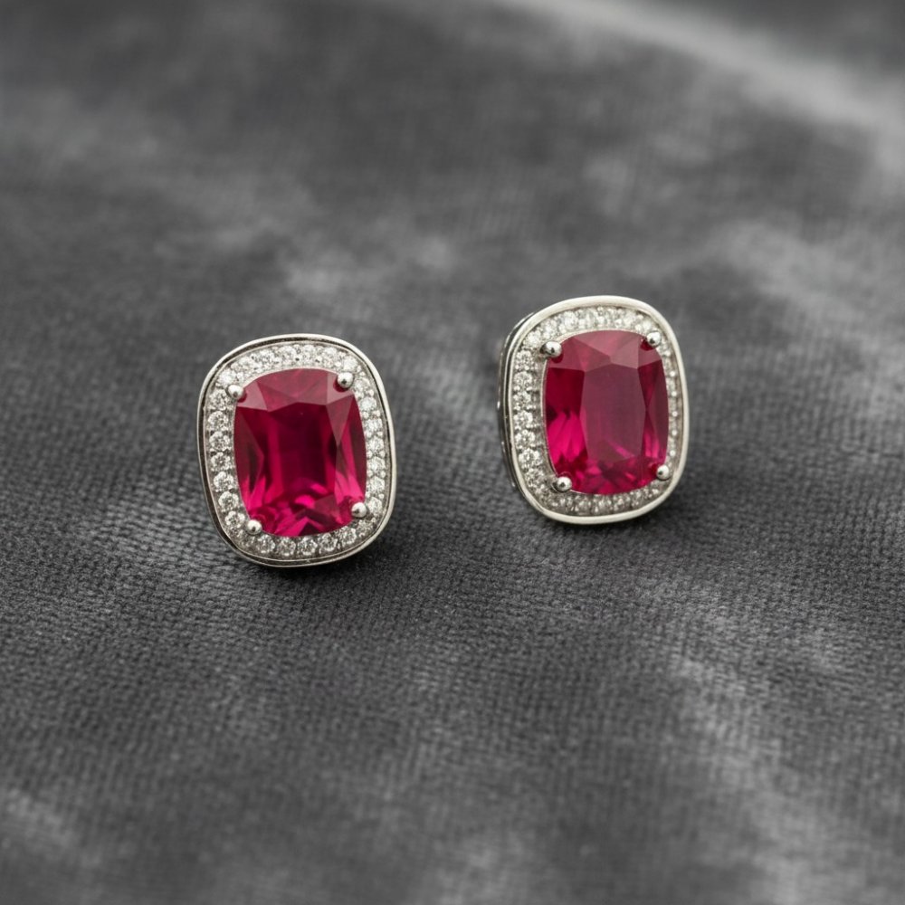 Regal Ruby Cushion Halo Studs