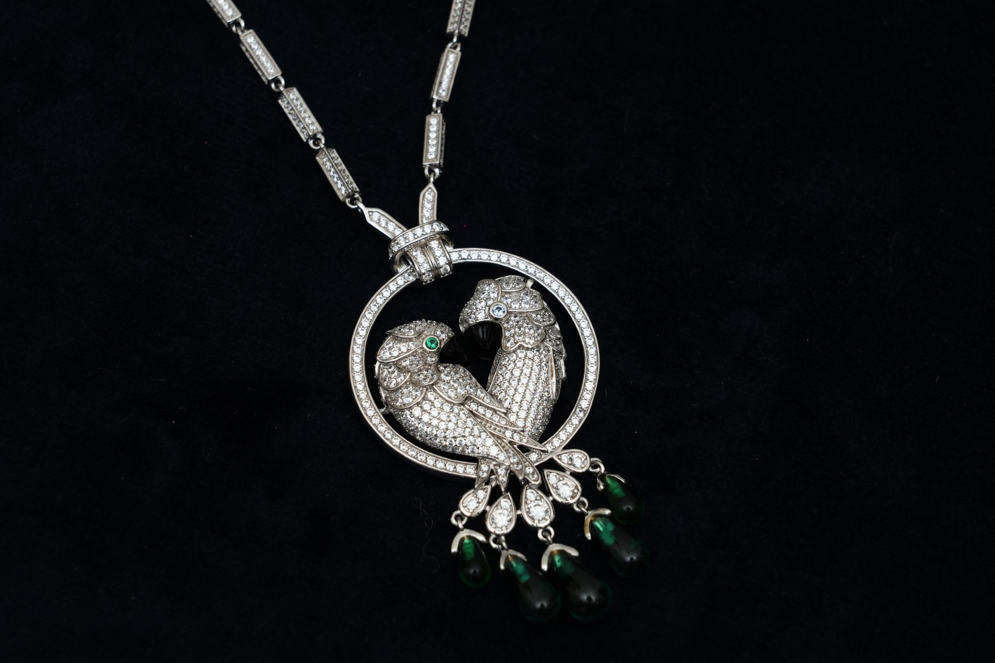 The "Eternal Lovebirds" Emerald Pendant.